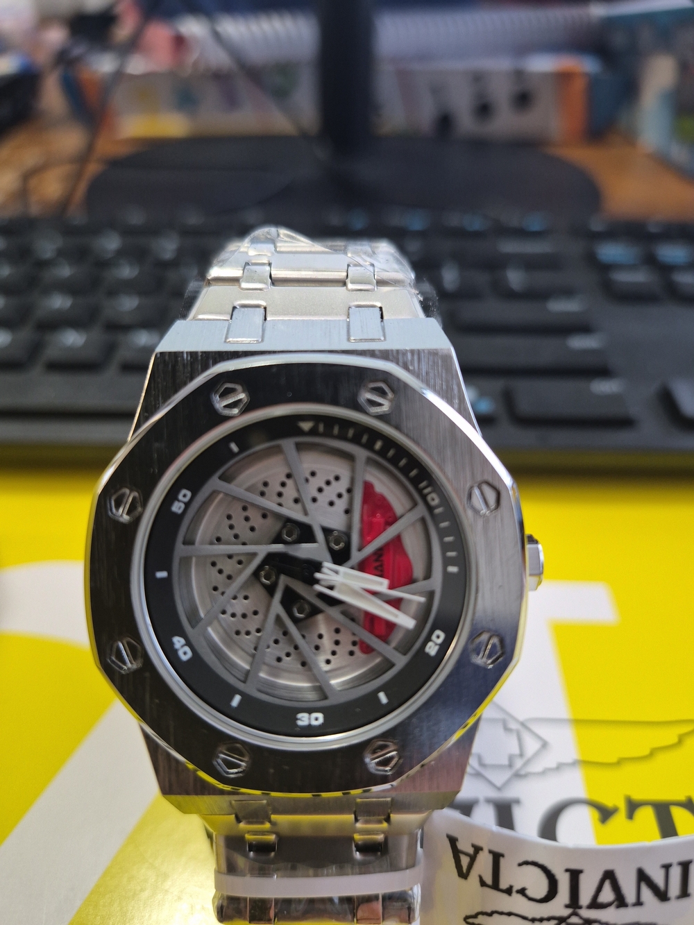 Invicta Silver Stainless Steel Watch with Red Accent